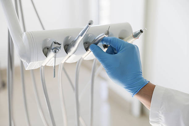 Professional Tooth Extraction technician working in Bayboro, NC